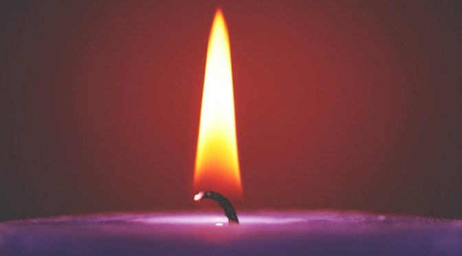 selective focus of purple candle